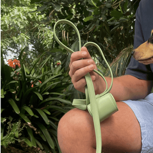 the sage green poop bag dispenser