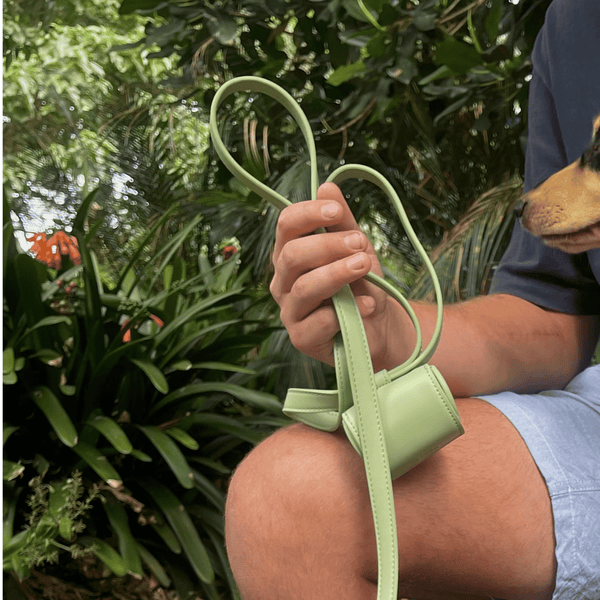 the sage green poop bag dispenser