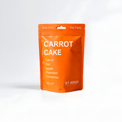 Orange package of St Argo Carrot Cake dog treats on a white background