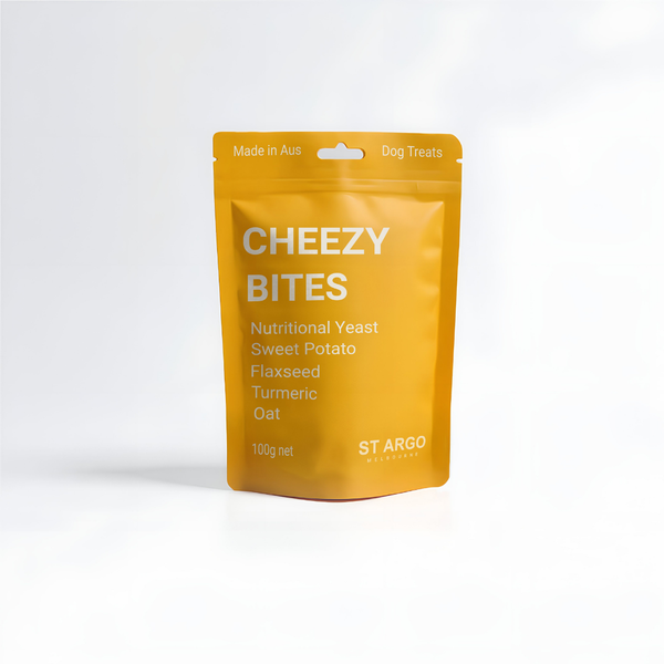 Yellow package of 'Cheezy Bites' dog treats on a white background