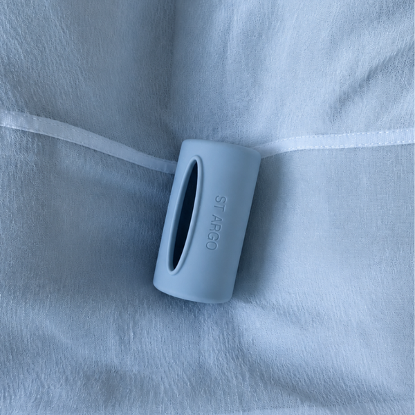 Waste Bag Dispenser for Dogs in Powder Blue with Blue Background