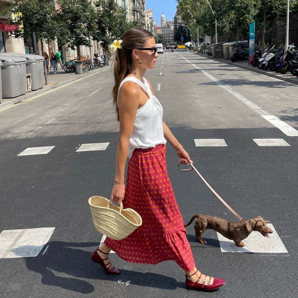 Pale pink vegan leather dog lead with rose gold hardware and happy dog owner walking in Australia